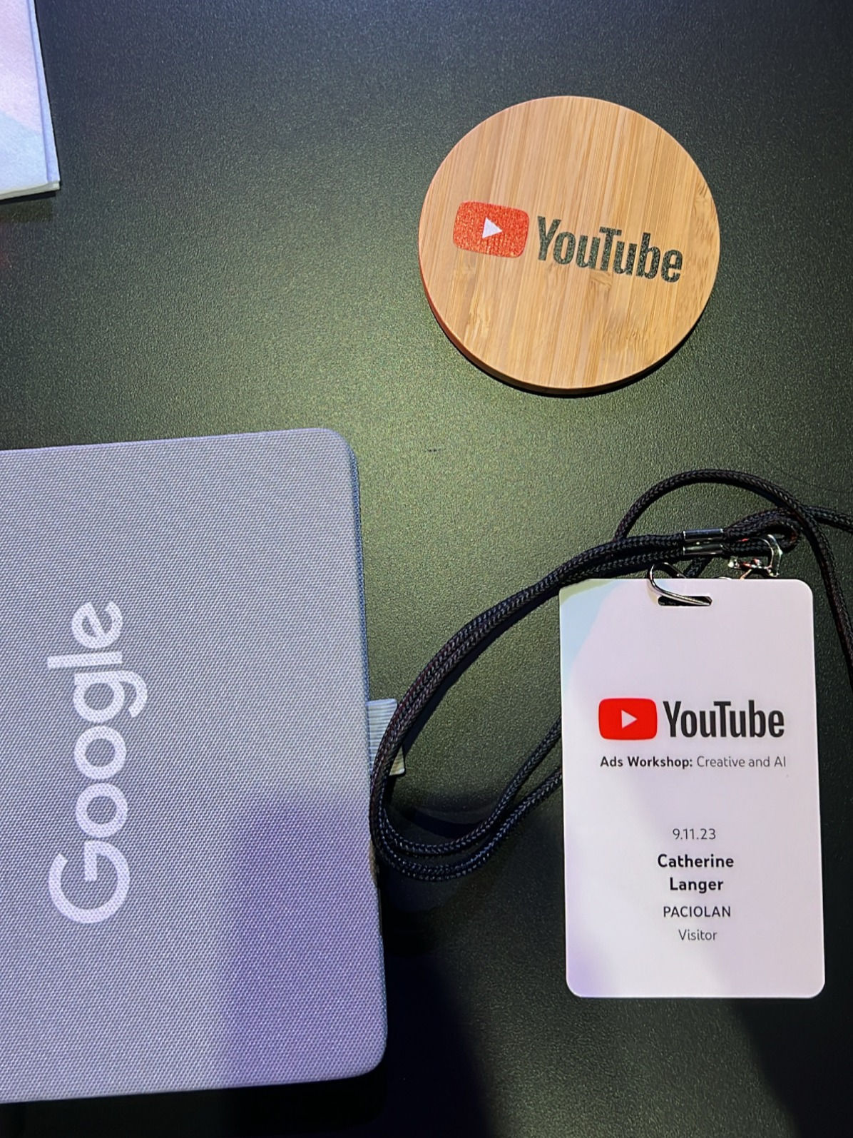 Google nametag, notebook and YouTube coaster 
